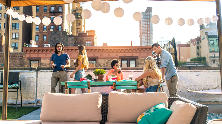 People on rooftop in city