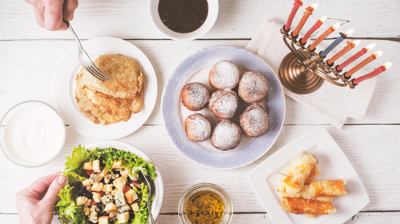 Hanukkah dishes and menorah