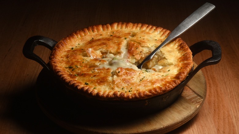 Chicken pot pie with utensil