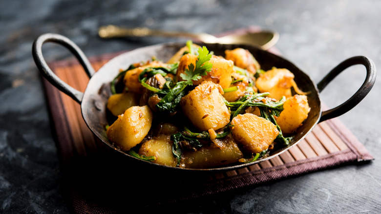 Aloo palak in black kadai