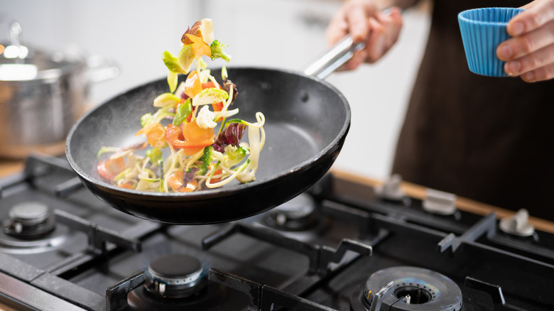 veggies tossed in sauté pan