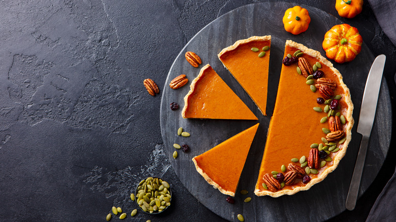 pumpkin pie displayed on granite