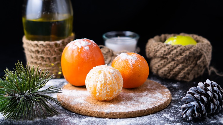 assortment of round fruits on New Year's