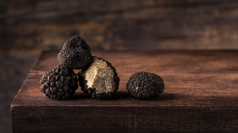 black truffles on wood