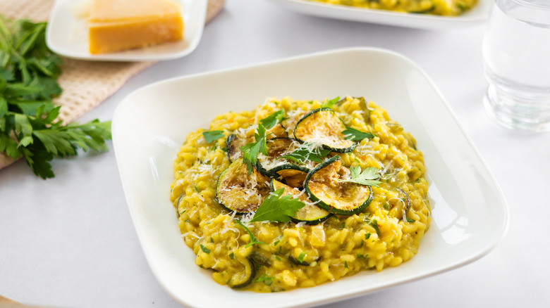 Saffron zucchini risotto in bowl