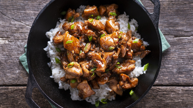 Top-down view of bourbon chicken in a pan