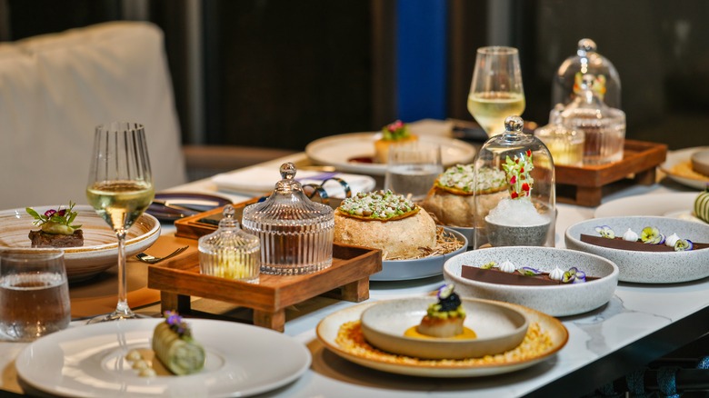 fine dining table with plated dishes