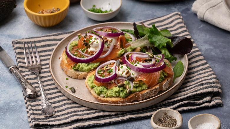 smoked salmon avocado toast served on plate