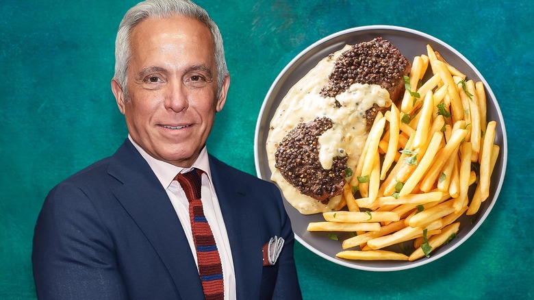 Geofrrey Zakarian smiling with steak au poivre