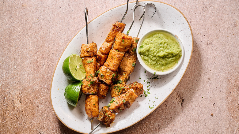 salmon skewers on a plate