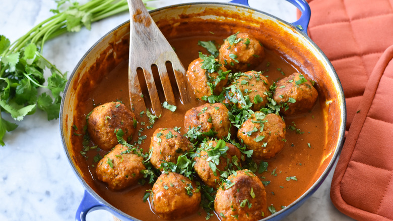 turkey meatballs in curry sauce in pot