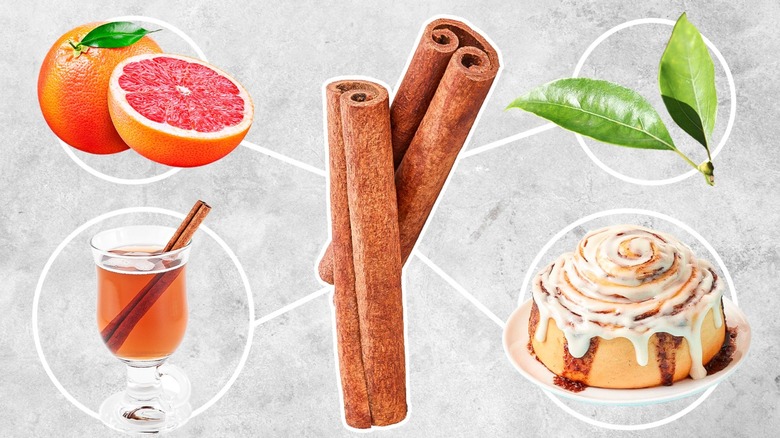 Cinnamon sticks, buns, leaves, and grapefruit