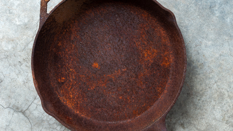 rusty cast iron skillet