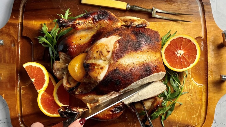 whole chicken with orange slices