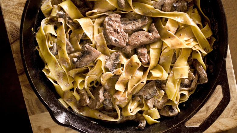 beef stroganoff in cast iron skillet