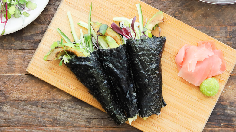 hand rolls on wooden board