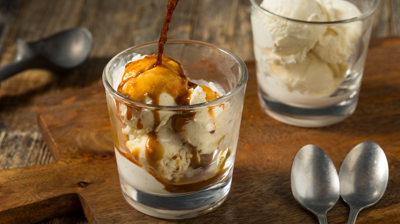 Espresso pouring over ice cream for affogato 