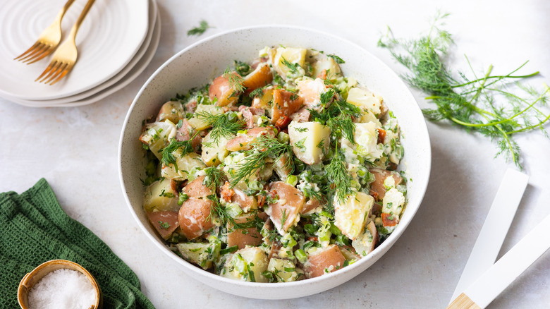 potato salad in white bowl