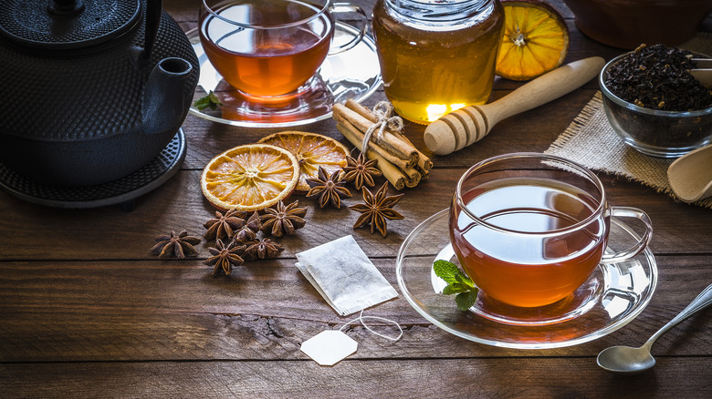 Cups of tea with spices