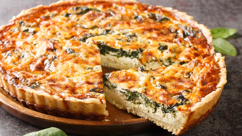 Quiche with cut slice 