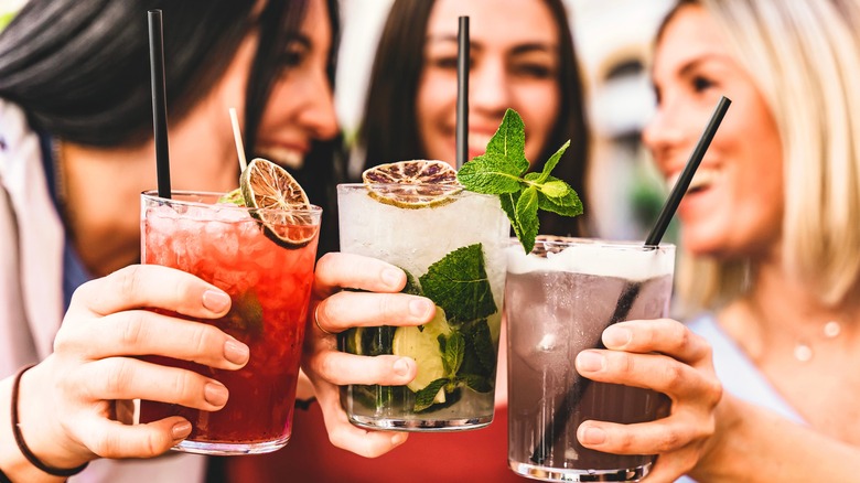 women toasting with cocktails