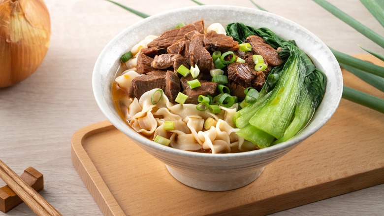 Bowl of soup with bok choy 